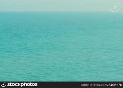 Infinite calm ocean from a birds eye view retro color stylized