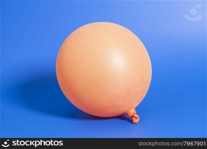 Inflatable balloon on blue background