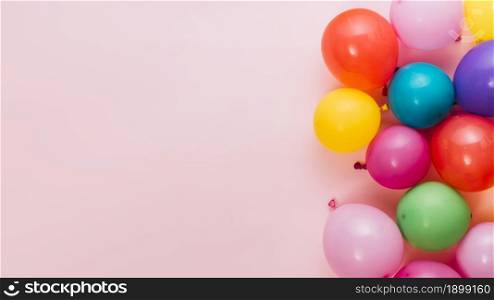 inflated colorful balloons pink backdrop with space writing text. Resolution and high quality beautiful photo. inflated colorful balloons pink backdrop with space writing text. High quality beautiful photo concept