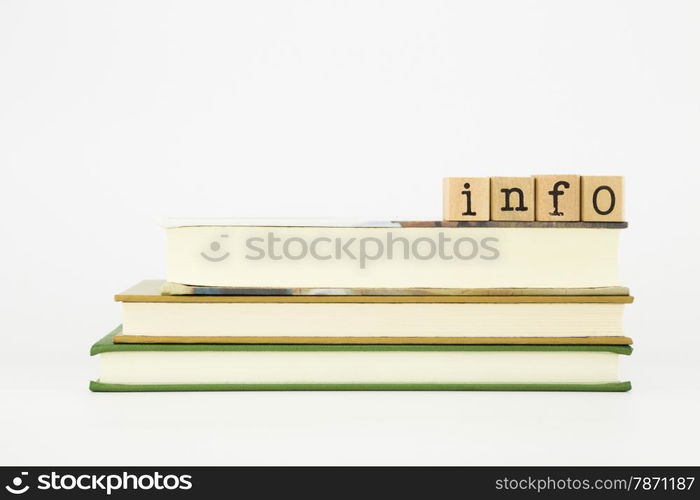 info word on wood stamps stack on books