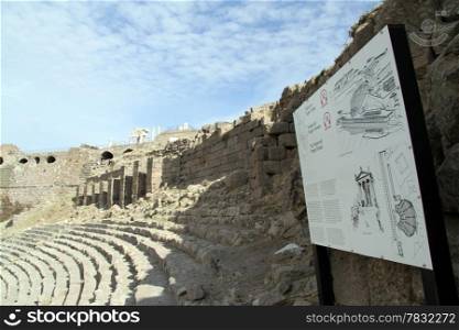Information board and ruins of theater in acropolis of Pergam, Turkey