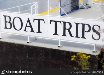 Information sign advertising tourist boat trips