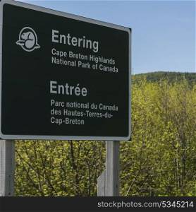 Information sign in forest, Cabot Trail, Cape Breton Highlands National Park, Cape Breton Island, Nova Scotia, Canada