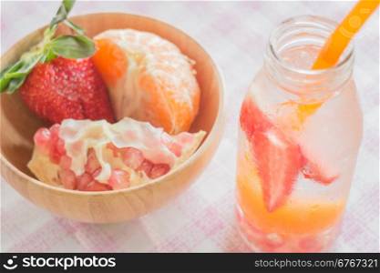 Infused water bottle of mix fruit refreshing drink, stock photo