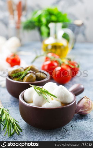 ingredients for caprese salad on a table