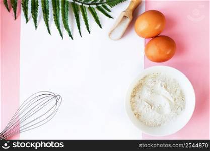 Ingredients for cooking baking - flour, egg, sugar, rolling pin on pink background. Concept of cooking dessert and sweet food.. Ingredients for cooking baking - flour, egg, sugar, rolling pin on pink background. Concept of cooking dessert.