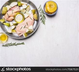 Ingredients for cooking duck breast with fruit, herbs and honey in a frying pan, border ,place for text