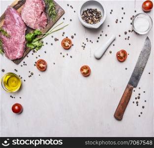 Ingredients for cooking Pork steak with vegetables and spices on wooden rustic background top view close up place for text,frame