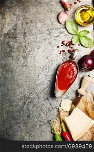 Ingredients for cooking spaghetti on rustic background. Italian food concept