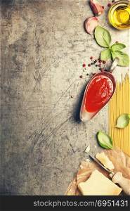 Ingredients for cooking spaghetti on rustic background. Italian food concept