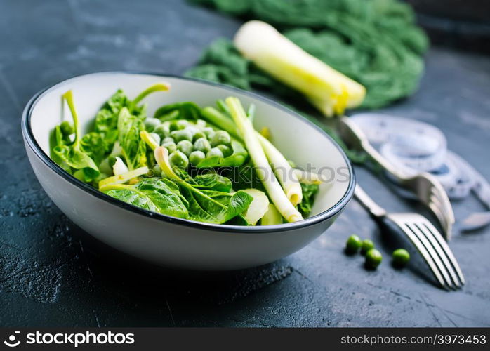 ingredients for diet salad in bowl on a table