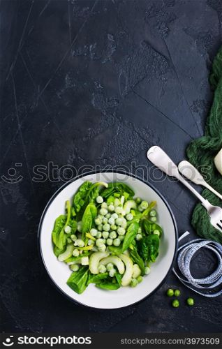 ingredients for diet salad in bowl on a table