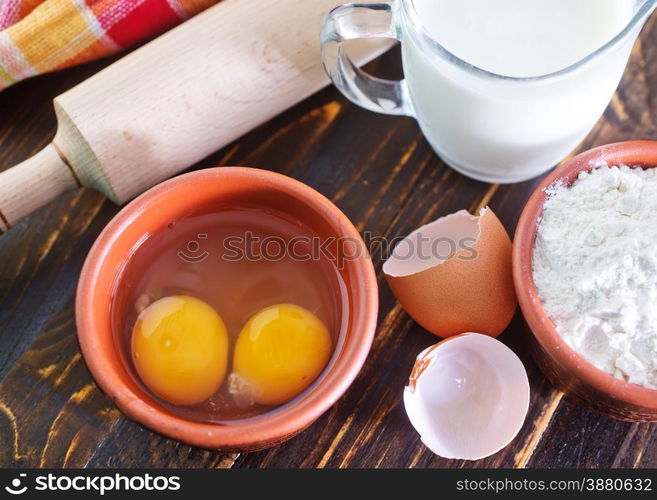 ingredients for dough on the wooden table