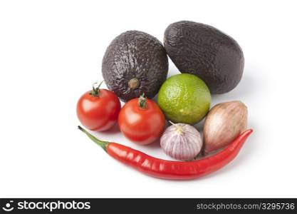 Ingredients for guacamole on white background