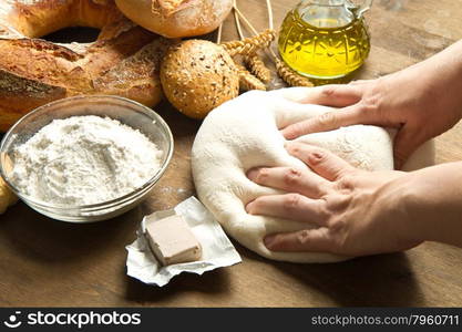 ingredients for homemade bread on wooden background