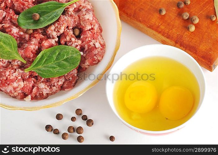Ingredients for homemade cutlet, ground beef, eggs and pepper