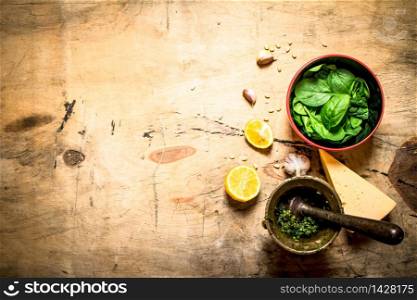 Ingredients for Italian pesto. On a wooden table.. Ingredients for Italian pesto.