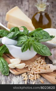 Ingredients for making pesto. Ingredients for making pesto sauce on the kitchen table