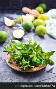 ingredients for mojito, fresh mint and lime