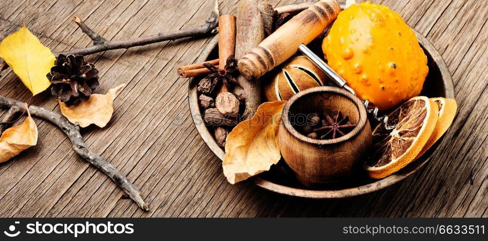 Ingredients for mulled wine on a retro background.Autumn drink mulled wine. Spice for mulled wine