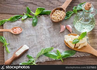 Ingredients for pesto on the wooden table