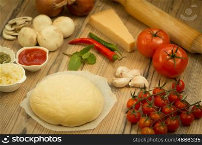 Ingredients for preparing a vegetarian pizza