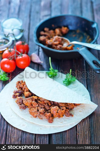 ingredients for taco, minced meat and dough