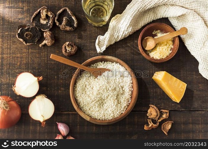 ingredients making risotto fungi rustic wooden table