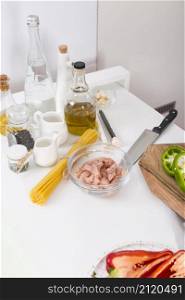 ingredients making spaghetti white table