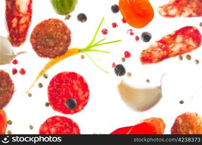 Ingredients of antipasto and white isolated background, close-up photo.