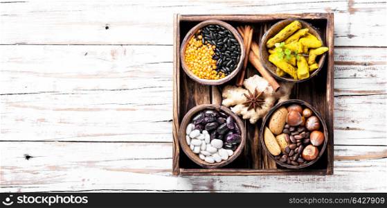 Ingredients of healthy food. Healthy eating food concept with nut, spice and vegetables