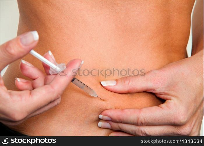 injection of insulin for blood sugar disease. control of blood sugar.