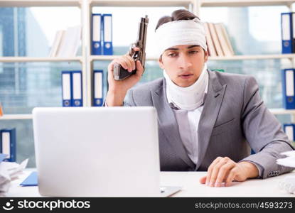 Injured businessman working in the office