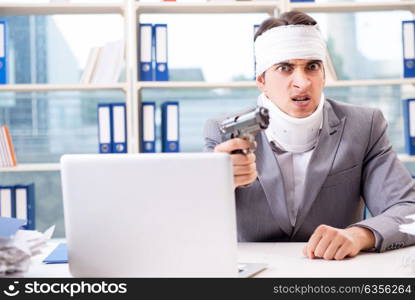 Injured businessman working in the office