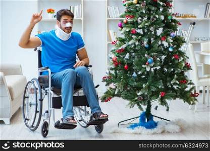 Injured disabled man celebrating christmas at home