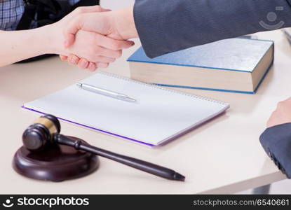 Injured employee visiting lawyer for advice on insurance