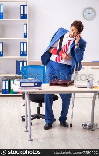 Injured employee working in the office