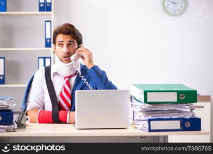 Injured employee working in the office