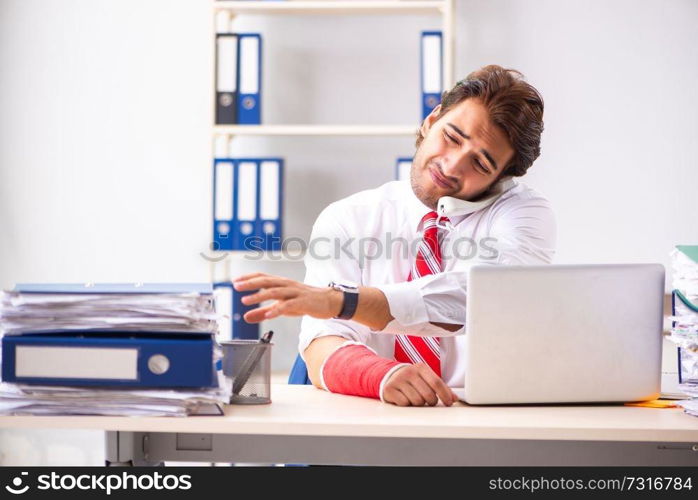 Injured employee working in the office