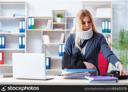 Injured female employee working in the office