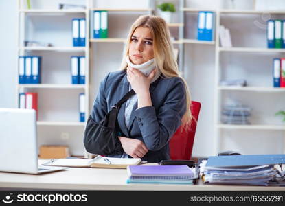 Injured female employee working in the office