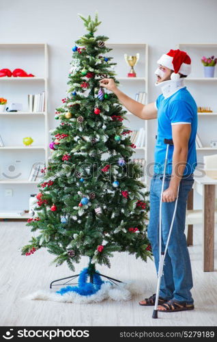 Injured man celebrating christmas at home