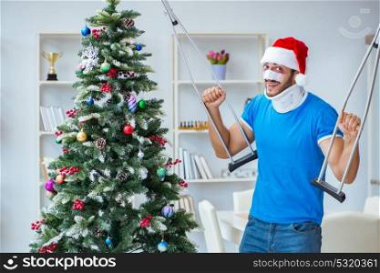Injured man celebrating christmas at home