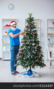 Injured man celebrating christmas at home