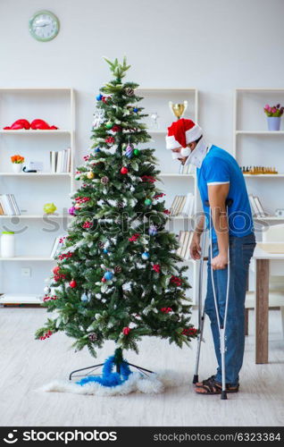 Injured man celebrating christmas at home