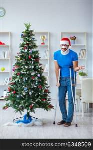 Injured man celebrating christmas at home