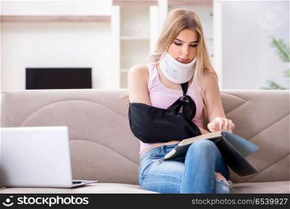 Injured woman student preparing to exams