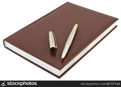 ink pen and book isolated on white background