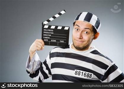Inmate with the movie clapper