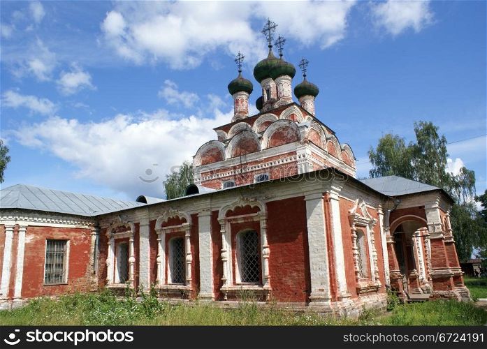 Inner yard and red brick church in Ostashkov, Seliger region
